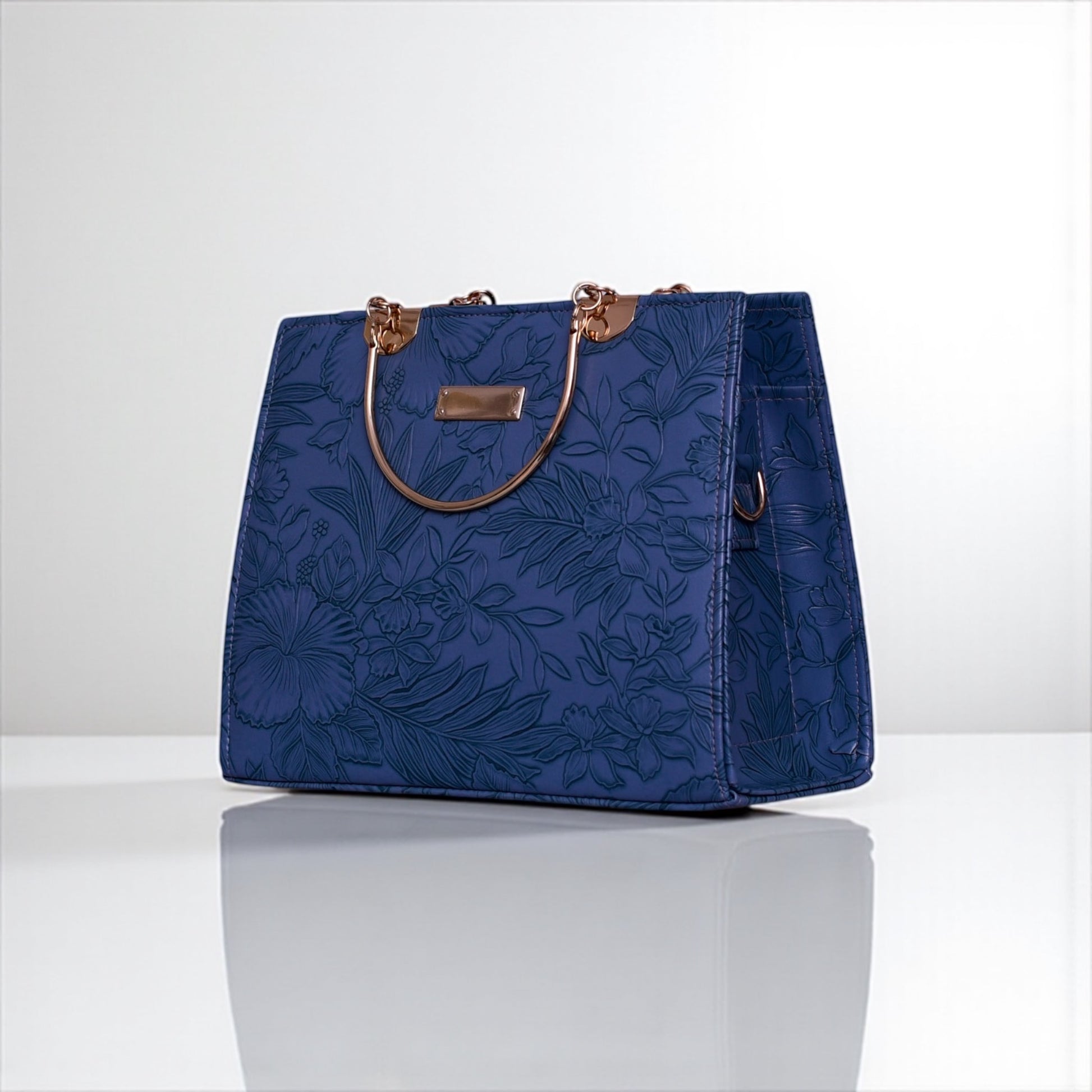 Elegant Floral Embossed Navy Handbag with Gold Handles