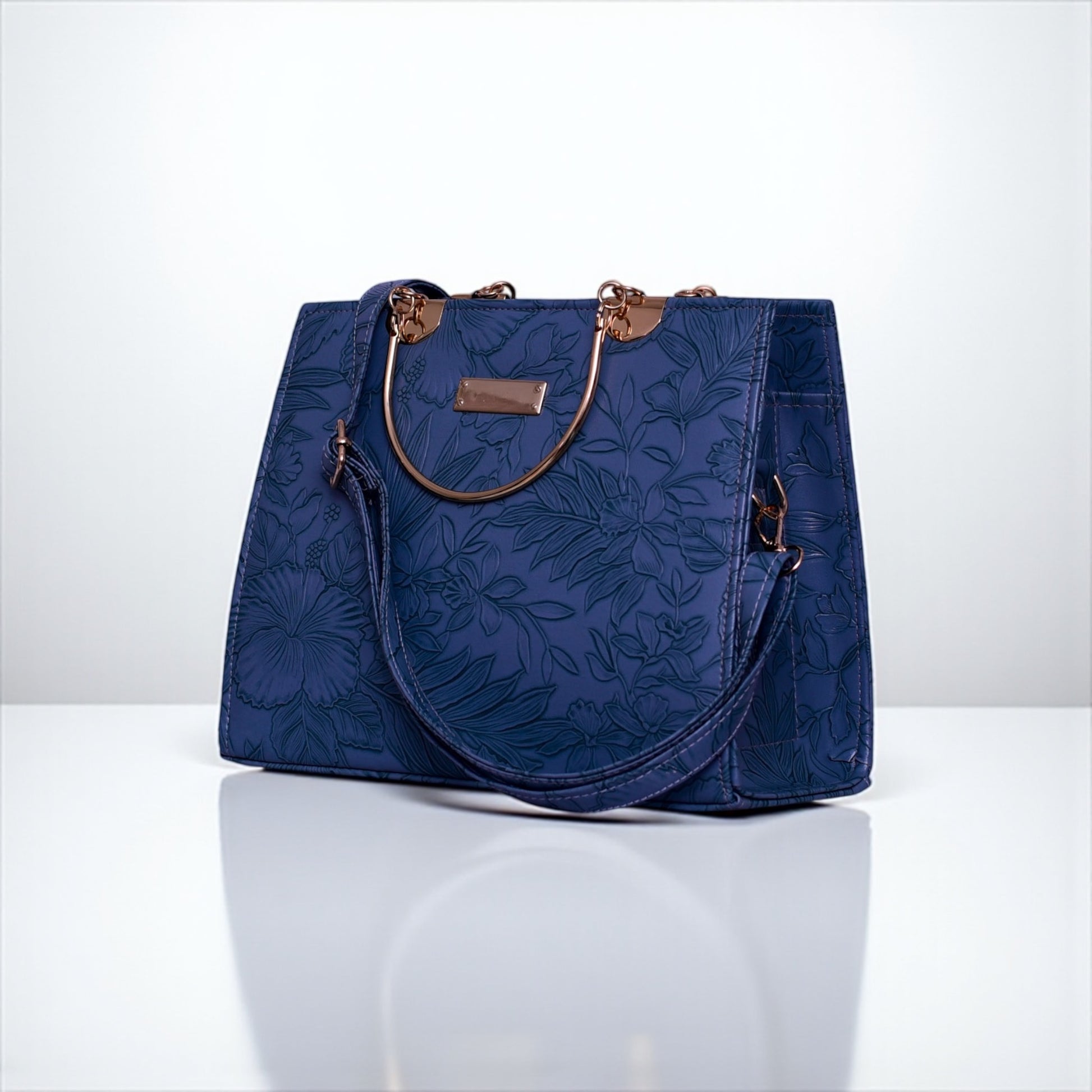 Elegant Floral Embossed Navy Handbag with Gold Handles